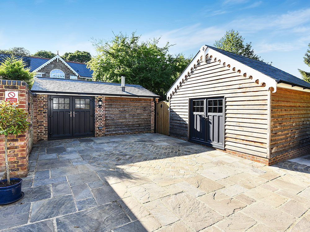 two wooden sheds