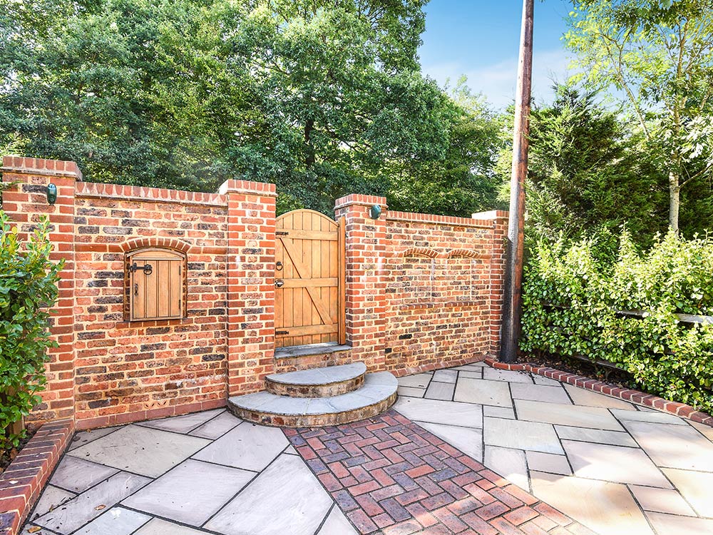 brick wall and gate entrance